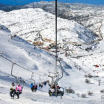 people taking cable car ride in mount hermon in israel