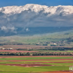 Hula Valley underneath the snow-capped Hermon mountain