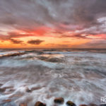 Raging waters of the mediterranean sea during sunset
