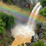 Rainbow over the raging Sa'ar Waterfall, Golan Heights, Israel