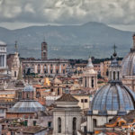 the rooftops of rome italy with various different styles of architecture