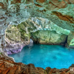 crystal clear blue water in the grottoes